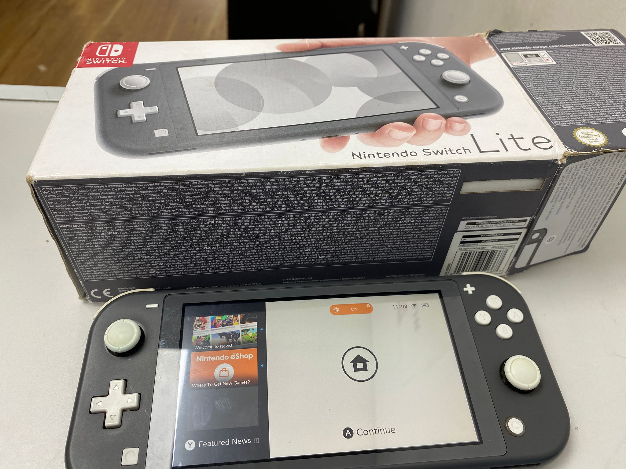 Pre-owned nintendo Nintendo Switch Lite 32GB Grey - Own4Less